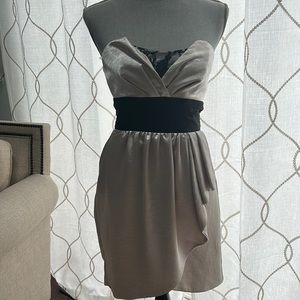 Champagne colored dress with black ribbon waist